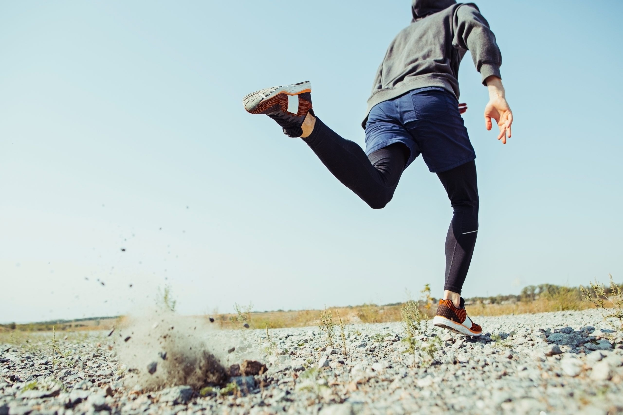 running sport man runner sprinting outdoor in scenic nature